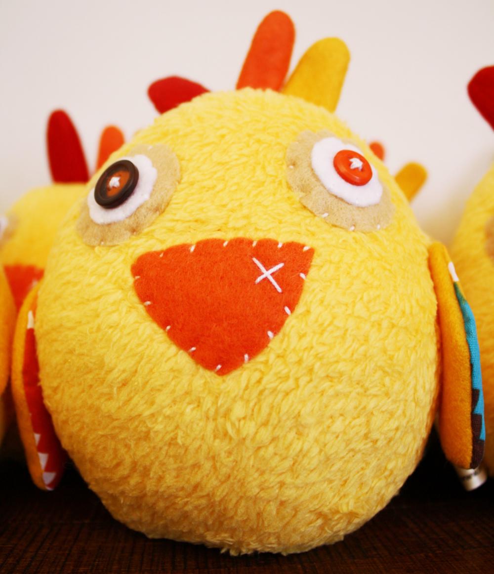 BOObeloobie Chatters the Chicken in yellow, red and orange tones